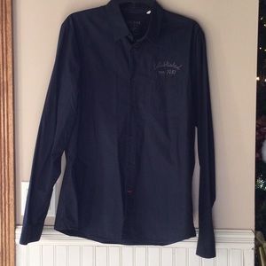 Men’s Black long sleeve Guess shirt.